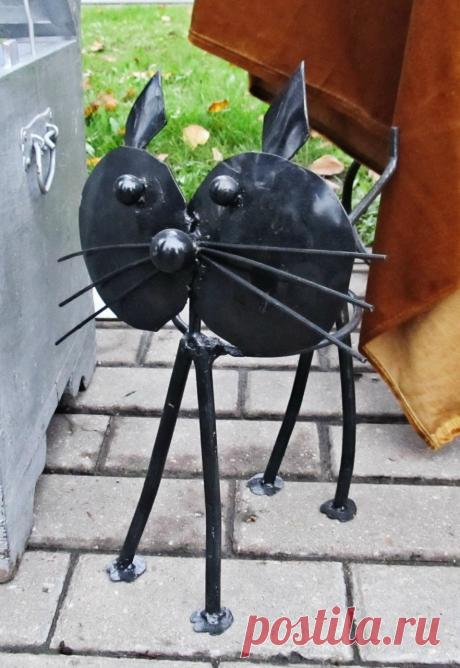 кот
металл