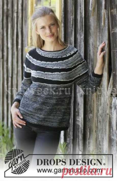 СВИТЕР ИСЧЕЗАЮЩИЕ КРУГИ

Потрясающая модель женского свитера, связанного на спицах 3.5 мм из тонкой пряжи на основе шерсти. Вязание модели начинается от воротника по кругу, далее вяжется круглая кокетка платочным узором частичным вязанием. Она состоит из шести секций, начало каждой передвигается, благодаря этому получается вот такой интересный эффект. Свитер из коллекции Drops осень/зима 2018/19.