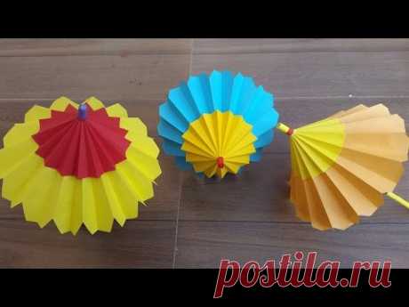 How to make a paper umbrella that open and closes- Step by step process.