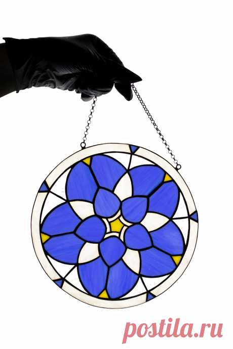 Stained glass suncatcher Forget-me-not flower mandala Window hanging d Window hanging suncatcher made of stained glass pieces by my own disign.Handmade using Tiffany copper foil technique.Looks amazing in the lights of a sun.You will get it completely ready for installation. It comes with a suction cup hanging and copper chain.It will be a great gift for friends or relatives. Width: 8 inc