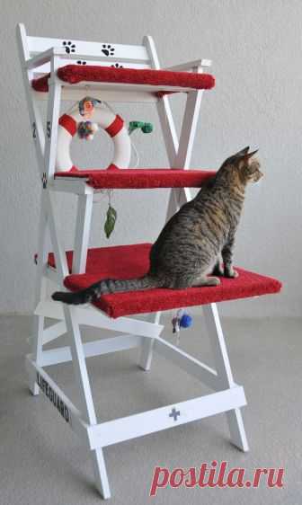 Lifeguard / large Here are photos of the original lifeguard cat chair we designed and built, with three steps, a slightly narrower width relative to the carpet upholstery and some variations on the decals. The crude spray-painted signs are reminiscent of the rough nature of actual lifeguard chairs, meant to mimic the