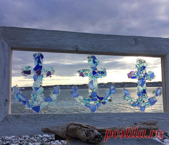 Three anchors in bright beach glass Three beautiful anchors designed in blues, greens and aqua tones of beach glass. To be hung in a window, trandom over a door or even placed on a mantle back lite with fairy lights. For the nautical lover. Framed in repurposed wood and lightly chalk painted in a white/ gray tone. Knicks