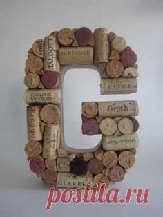 Wooden letter with corks hot-glued on... Cute idea!