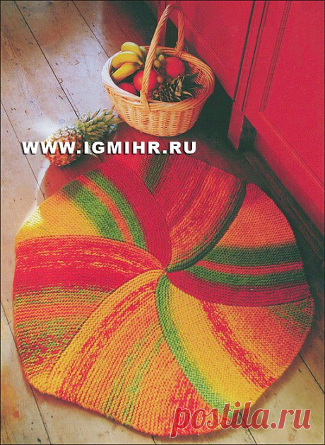 Яркий круглый коврик для украшения домашнего интерьера. Спицы.