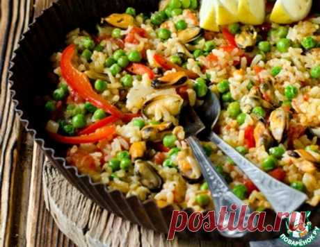 Паэлья с мидиями, перцем и горошком – кулинарный рецепт