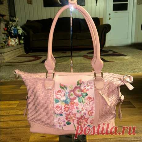 Sharif NY • Pink W/ Multi-Colors Floral Embroidery • Shoulder Bag Shop tonyachavez69's closet or find the perfect look from millions of stylists. Fast shipping and buyer protection. Sharif NY • Leather • Pink W/ Multi-Colors Floral Embroidery • Shoulder Bag. This bag is in MINT  condition & has never been used. 
$100
Details: 
1.) Floral Embroidery on both sides of purse 
2.) Genuine Leather; Lining: Polyester 
3.) Size of bag: 15 x 9 x 4” inches 
4.) Hang drop: 7” in. 
5.) Zi...