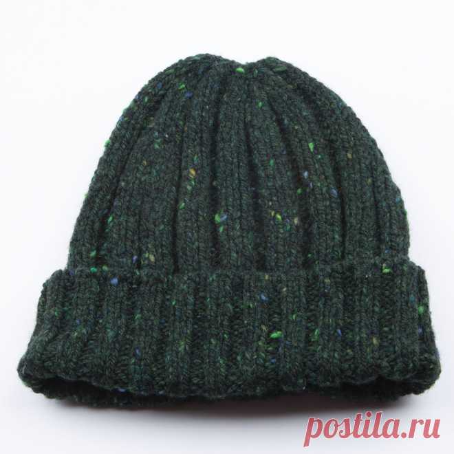 Шерстяная шапка FDS71M Bottle Green от Fisherman Out of Ireland Тёплая вязаная шапка из мягкой шерсти мериноса. Изготовлена в Ирландии на фабрике Fisherman Out of Ireland из местной пряжи в темно-зеленых тонах.