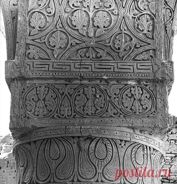 Interior detail showing decoration on capital, impost, and arch soffit with paisley and leaf motifs | Archnet