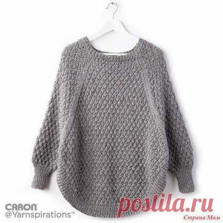 Пончо с рукавом реглан и теневым узором 

Источник: https://knitweek.ru/modeli/poncho-s-rukavom-reglan-i-..