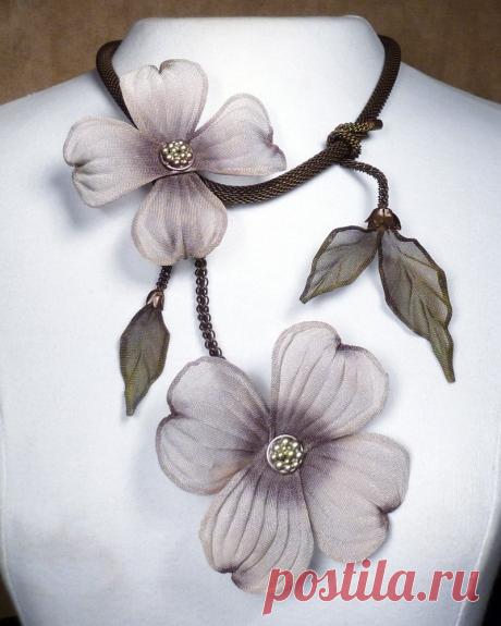 Dogwood Blooms Necklace by Sarah Cavender (Metal Necklace) | Artful Home Dogwood Blooms Necklace by Sarah Cavender. A mesh tubular chain holds hand painted mesh dogwood blooms and leaf vine accents. Hook closure, with 3; adjuster chain.