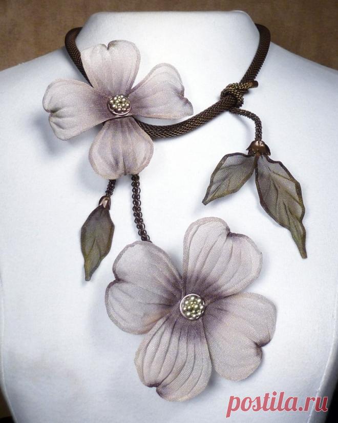 Dogwood Blooms Necklace by Sarah Cavender (Metal Necklace) | Artful Home Dogwood Blooms Necklace by Sarah Cavender. A mesh tubular chain holds hand painted mesh dogwood blooms and leaf vine accents. Hook closure, with 3; adjuster chain.