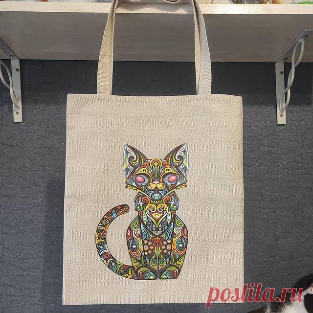 Photo by Елена Галетка (Рутто) on April 02, 2021. May be an image of cat and purse.