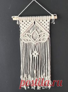Wooden Necklace Wall Hangings Large macrame hanging decoration for the wall in the living room, bedroom or hallway will add interior design and make it unique. Macrame wall decor looks like a necklace and will please residents of the house and guests. The central part of the wall hanging is decorate