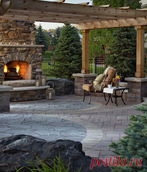 This outdoor space utilizes multiple paver types for a uniquely beautiful patio, simply perfect for fall. | Perfect Patios