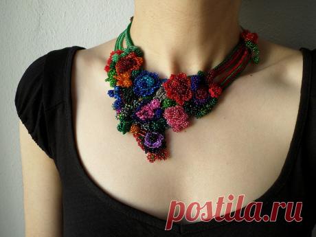 colorful freeform crochet bib necklace - statement necklace with red, purple, pink, blue, gray and green beaded crochet flowers by irregular expressions | Flickr - Photo Sharing!