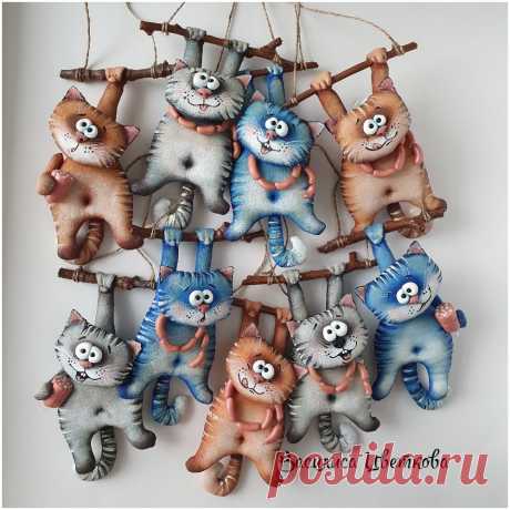 Кот с сосисками