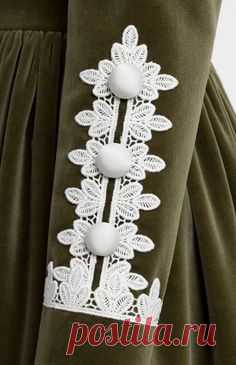 Long-sleeve cotton velvet dress with cotton lace finish. Mandarin collar. Hidden back zip closure. Side seam pockets.