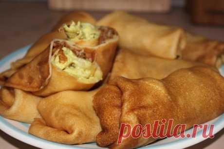 ОЧЕНЬ ВКУСНЫЕ БЛИНЫ С НАЧИНКОЙ ИЗ КУРОЧКИ С ГРИБАМИ В СЛИВКАХ

НАМ ПОТРЕБУЕТСЯ:: 
-Куриное яйцо - 4 шт. 
-Молоко коровье - 700 мл 
-Сахар тростниковый - 1 ст. л. 
-Мука пшеничная - 8 ст. л. 
-Растительное масло - 2 ст. л. 
-Куриная грудка - 2 шт. 
-Шампиньоны - 300 г 
-Сливки 20-22% - 200 мл 
-Соль морская - 1 ч. л. 
-Карри - 1 ст. л. 
-Твердый сыр - 200 г 

Приготовление: 
Яйца немного взбить с сахаром, солью и 300 мл теплого молока, добавить муку, тщательно перемешать, ч...