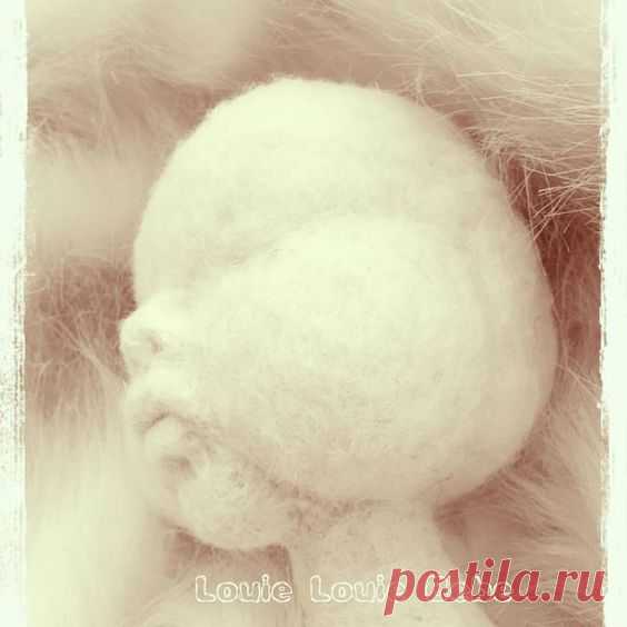 I love needle felting. I especially enjoy needle felting these sculptured doll faces, although it is a long