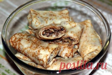 БЛИНЧИКИ "ЛИТЕРАТУРНЫЕ". Фото-рецепт Екатерины Гладушиной: блинчики сделаны на минеральной газированной воде. Идею для начинки подсказали мне "Старосветские помещики". Там Афанасий Иванович очень любит пирожки "с гречневой кашей и капусткою". Меня заинтересовало, решила попробовать. Поджарила лук, потом положила капусту квашеную, замороженные грибы. Все хорошенько потушила, поджарила, добавила готовую гречку и еще обжарила. Получилось вкусно. 

Делала тесто, как и всегда д...