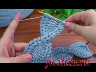 Простая, но очень стильная вязаная повязка для волос изогнутой формы