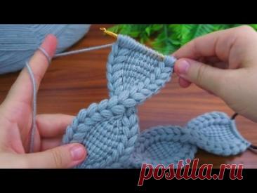 Простая, но очень стильная вязаная повязка для волос изогнутой формы