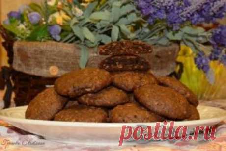 Овсяное шоколадное печенье  Шоколадное овсяное печенье - очень вкусная домашняя выпечка. Это любимое печенье моего сына. Готовится оно легко и просто, а результат - замечательный. Печенюшки получаются слегка хрустящими по краям и мягкими внутри. Готовлю его очень часто по просьбам детей и мужа! Попробуйте и вы этот незатейливы