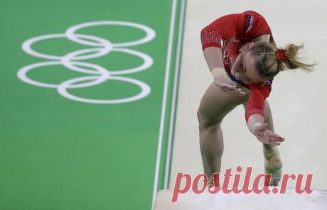 Мария Пасека. © AP Photo/Julio Cortez. РИО-ДЕ-ЖАНЕЙРО, 14 августа. /ТАСС/. Российская гимнастка Мария Пасека завоевала серебро в опорном прыжке на Олимпийских играх в Рио-де-Жанейро. Ее результат в финале - 15,253 балла. Победу одержала американка Симона Байлз (15,966)... Подробнее на ТАСС:
https://tass.ru/sport/3537468  |  ТАСС: Спорт - Гимнастка Мария Пасека завоевала серебро в опорном прыжке на Олимпиаде