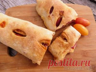 Вкусная пицца-рулет «Стромболи» Сочная, много сыра и безумно вкусная пицца! Готовили «Стромболи» в первый раз, заворачивали пиццу-рулет двумя способами. В нашей семье мнения разделились, а какой способ понравился вам? Приготовьте и ...