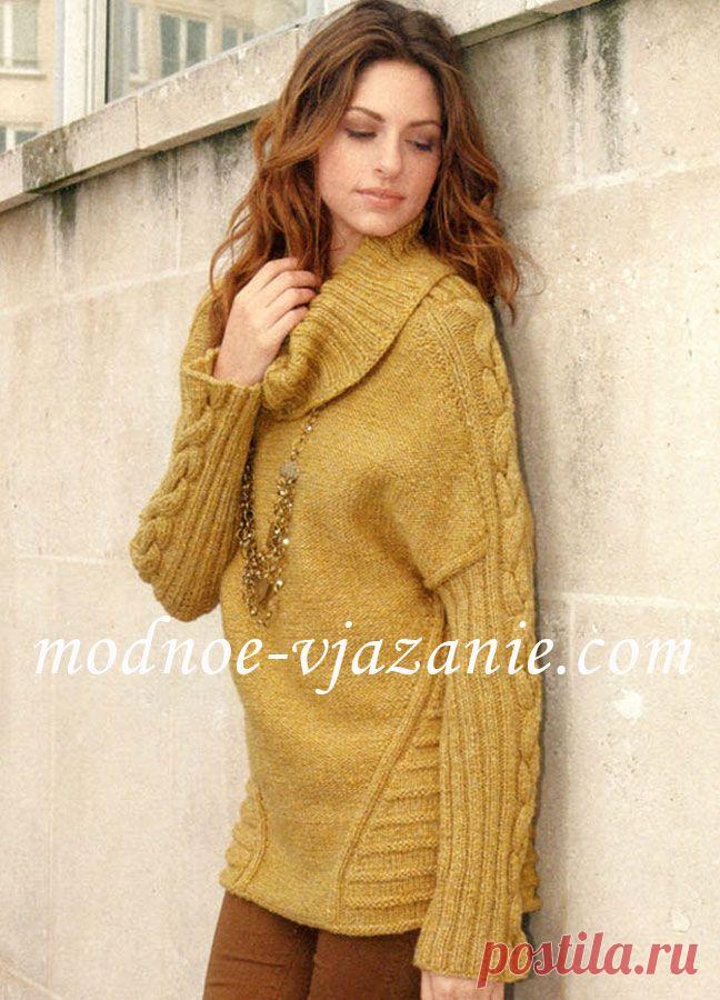 Удлиненный свитер с косами