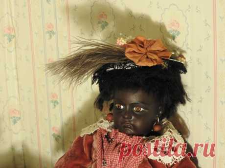 petite size black Bru Jne  doll with leather body by Yuliya Skari  | eBay For you consideration one of kind Black bru jne reproduction by Yuliya Skari petite size.Doll hand made from white porcelain till pure brown color skin.Head has brown glass eyes,earrings.She has sheep skin wig.Her body made by sheep leather.Lower hands porcelain,lower legs composition.Doll has hand made underwear,bust,socks,hand made leather shoes with stamp bru jne. | eBay!
