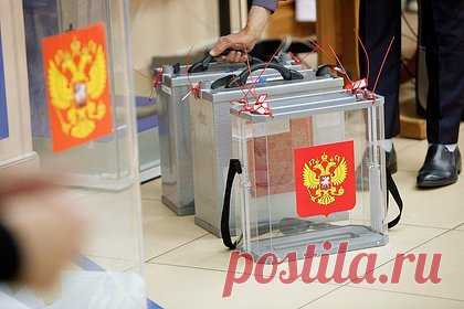 Россиян позвали на выборы плакатом на разрушенном немецком здании