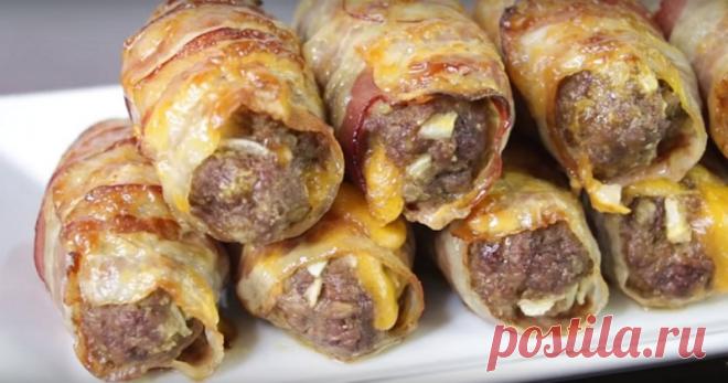 М'ясні міні-рулети: відмінний «сюрприз» на обід або святковий стіл М'ясні міні-рулети з простих і доступних продуктів виходять напрочуд соковитими і ніжними. Рулети дуже смачні, ситні, виглядають апетитно.