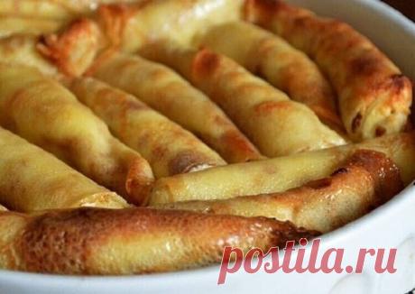 Налистники с творогом я впервые попробовала на свадьбе у друга, которая была в деревне. Их вкус покорил меня навсегда. После свадьбы я раздобыла рецепт этих чудесных налистников, и теперь сама радую свою семью этим чудом. Готовятся они на молоке и крахмале, получается тоненькие, нежнейшие и ароматные, по-домашнему теплые и удивительно вкусные!