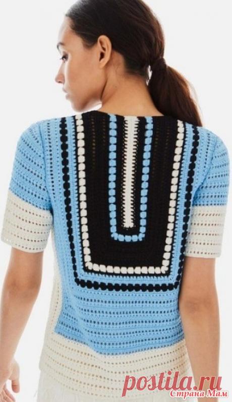 . Кофта с геометрическим узором крючком Эта летняя кофточка, связанная крючком в этническом стиле, смотрится ярко и современно. https://woman7.ru/