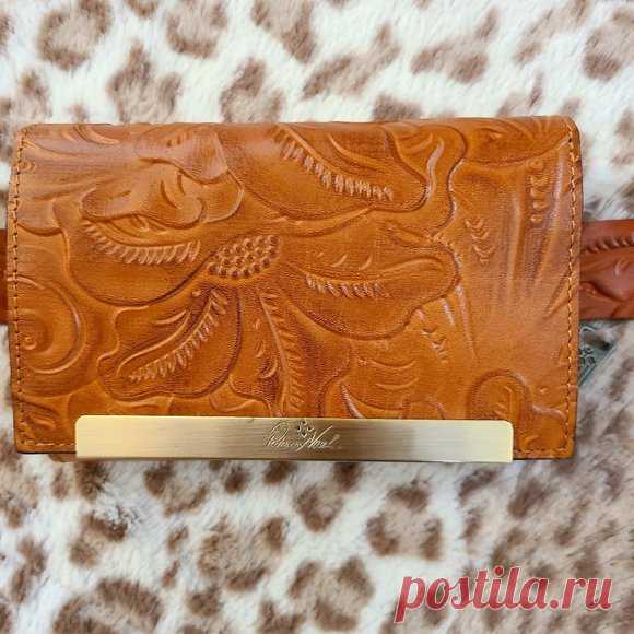 Patricia Nash S/M belt that comes with a wallet that fits on the belt.  You can wear it with or without the wallet. NWOT - never worn.  Unfortunately, the belt was too small for me.  Definately runs more the small. The wallet has several compartments (see pictures)