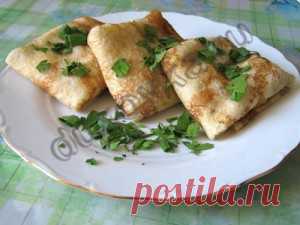 Блинчики с начинкой из куриной грудки, тушеной в сметанном соусе