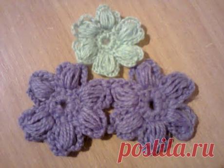 Пышный цветочек из вытянутых петель.  Lush flower of elongated loops.