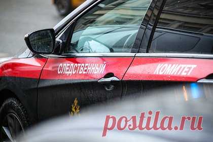 В гараже в российском городе нашли мертвых мужчин и женщину