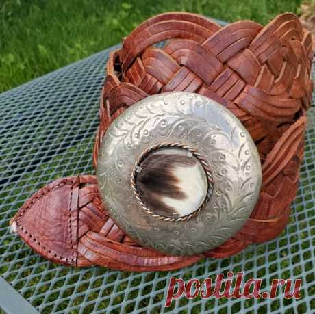 Moroccan belt Shop bbrakatakk's closet or find the perfect look from millions of stylists. Fast shipping and buyer protection. Boho wide woven leather belt with silver toned belt buckle with horn accent. Can be worn high waisted, or low on hips. Adjustable size.

Total length : 42.5"
Belt width : 3.5"
Buckle diameter : 4"