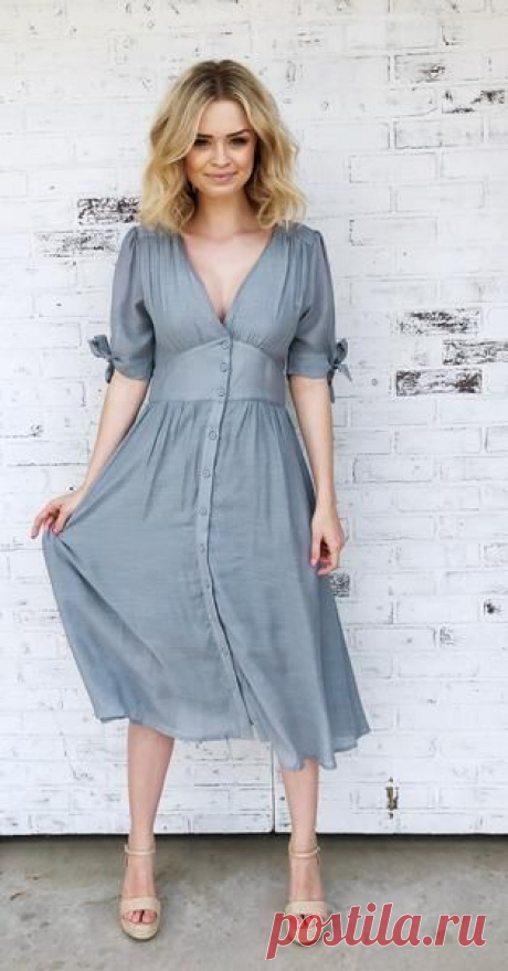 With a sweet vintage appeal, this midi dress has a... - 2019 Hijab Clothing With a sweet vintage appeal, this midi dress has a button down V neckline and empire waist. It is accented with cuffed tie sleeves and pockets. Function