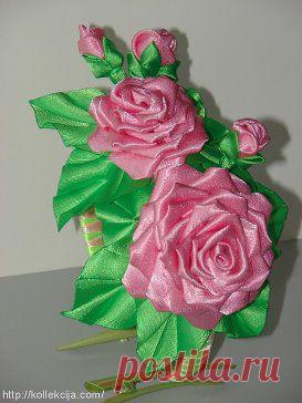 Как сделать бутон розы из ленты.
http://kollekcija.com/buton-rozyi-iz-lentyi-avtor-sagarovskaya-viktoriya/