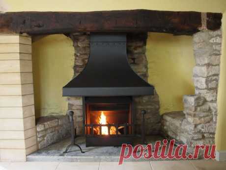 Фото дизайна гостиной с камином, интересные решения