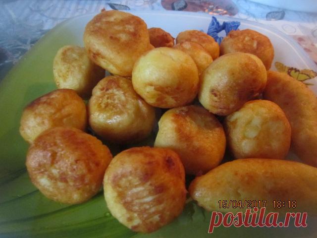 Картофельные шарики и лохматая сосиска