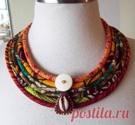 African Fabric Cord Necklace with horn cowrie от paintedthreads2