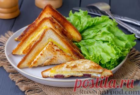 Горячие бутерброды с колбасой и яйцом (на сковороде)