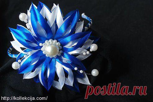Как сделать канзаши из узкой ленты.
http://kollekcija.com/kanzashi-iz-uzkoy-lentyi-avtor-ekaterina-sotnikova/
