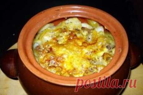 Мясо в горшочке с картофелем и сыром
