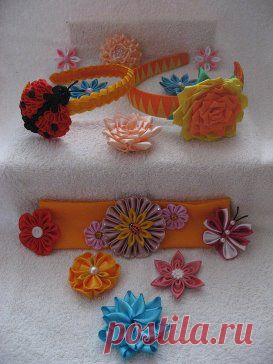 Искуство создание цветов в технике" Канзаши" Техника эта  украшения  нашла продолжение в изготовлении колец, брошек, ожерелий, подвесок для мобильников. Такими цветами можно украсить и обручи, и элегантные повязки, и резинки для волос. А как мило смотрятся с ними миниатюрные браслеты, поскольку не только разноцветные ткани и атласные ленты могут служить производными для создания цветов, но и стразы, бисер, лоскутки.
 по всем вопросам  писать
 barabash.n@inbox.ru
•••