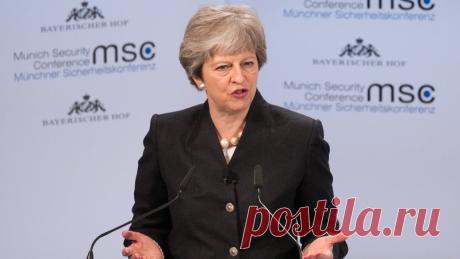 May wins backing for new security treaty with EU